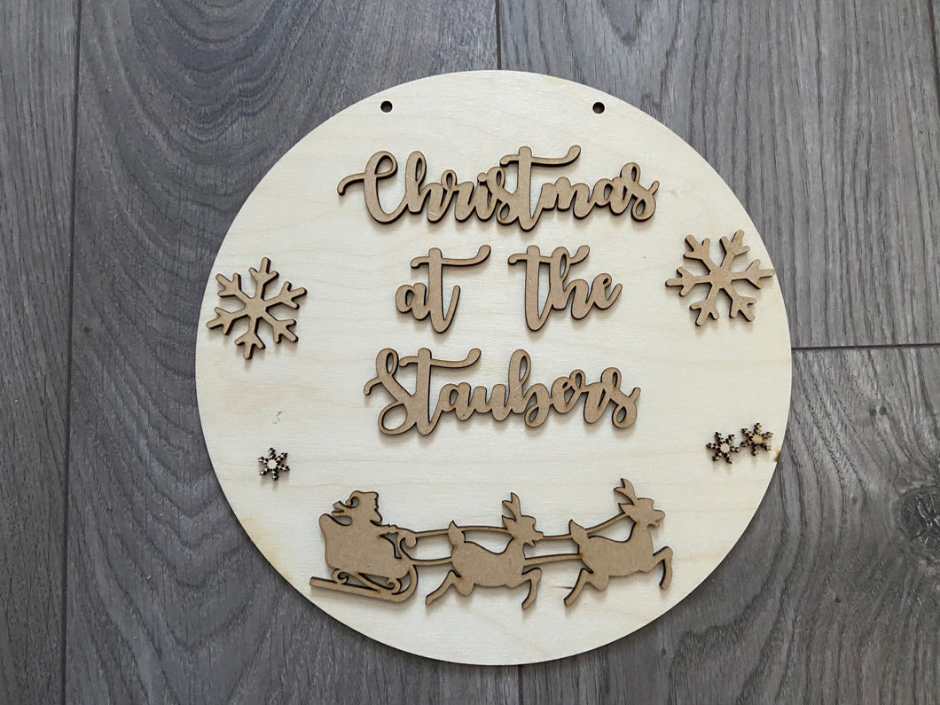 Wooden personalised circle plaque with sleigh and snowflakes - Laser LLama Designs Ltd